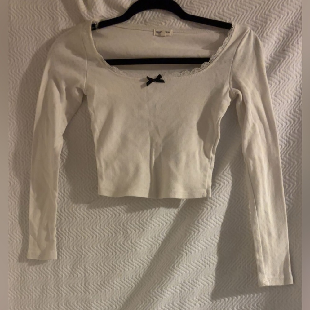 Cream Long Sleeve Bodysuit with Black Bow